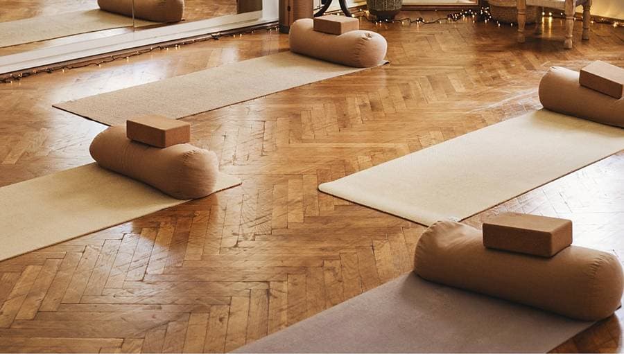 Mats and bolsters on herringbone parquet