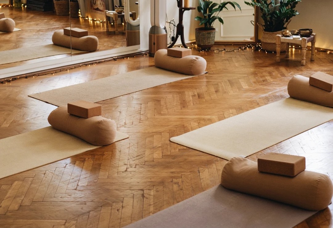 Mats, blocks and bolsters on the herringbone parquet